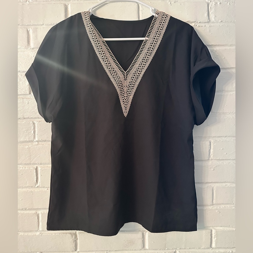 Elegant Black Top with Lace Detail